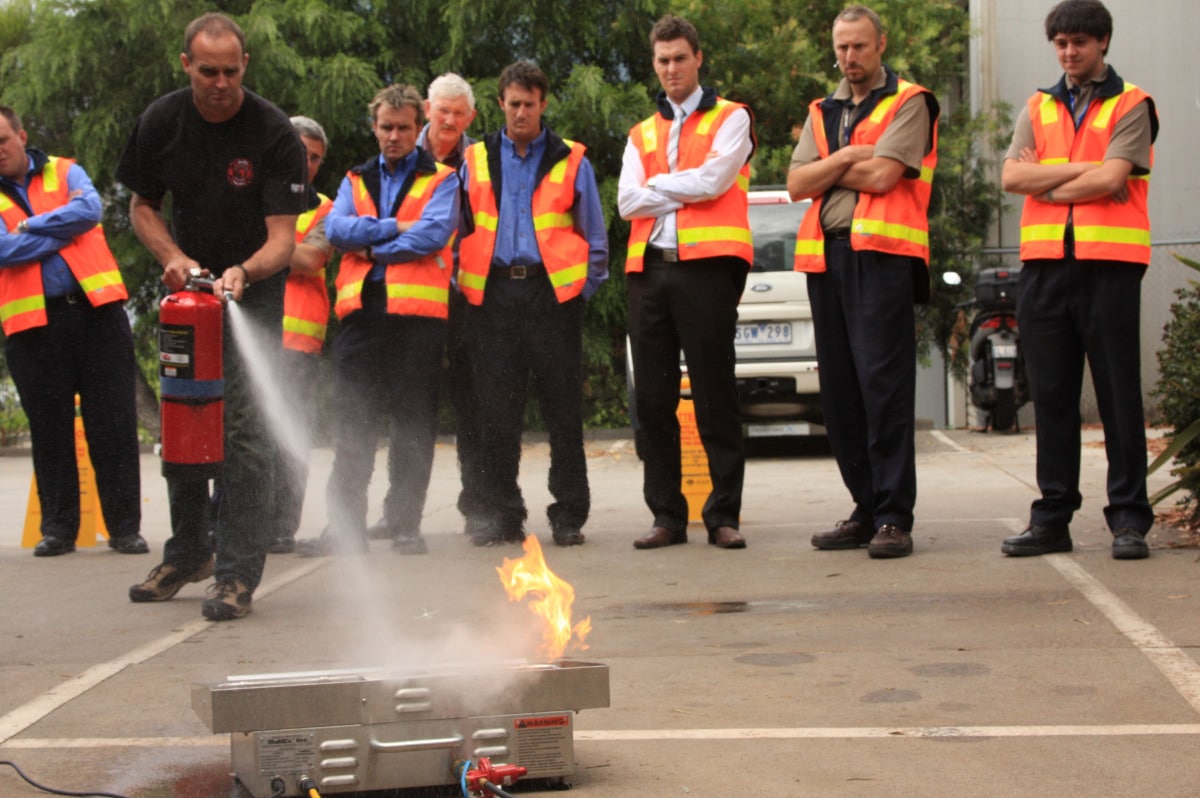 Firefighters at CMG Fire and Safety Services during a training session on extinguishing fires.